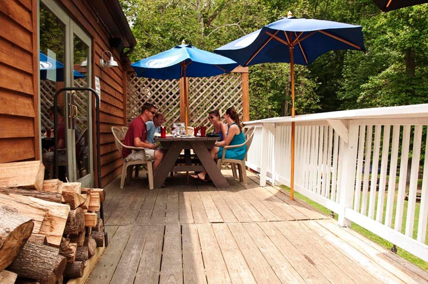 the deck out back, umbrellas up